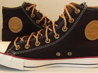 Black and Biscuit High Top Chucks  Inside patch views of black and biscuit high top chucks.